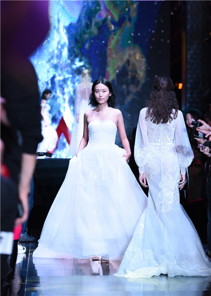 Models present creations at W Beijing's fashion wedding show