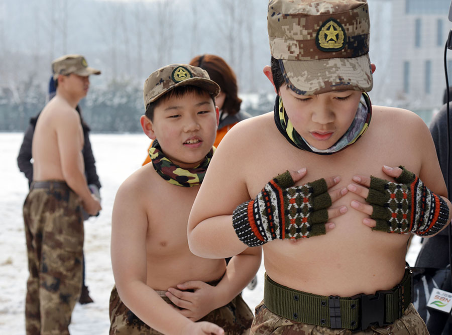 Topless children in wintry cold raises online furor