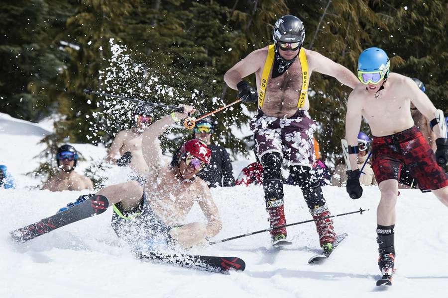 Skiing and snowboarding in bikinis and shorts