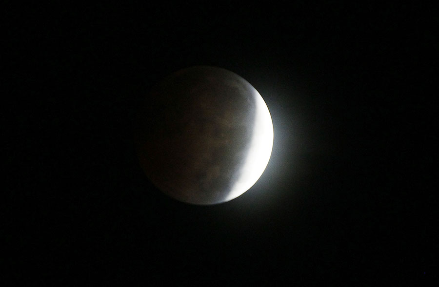 Lunar eclipse in Asia and the Americas