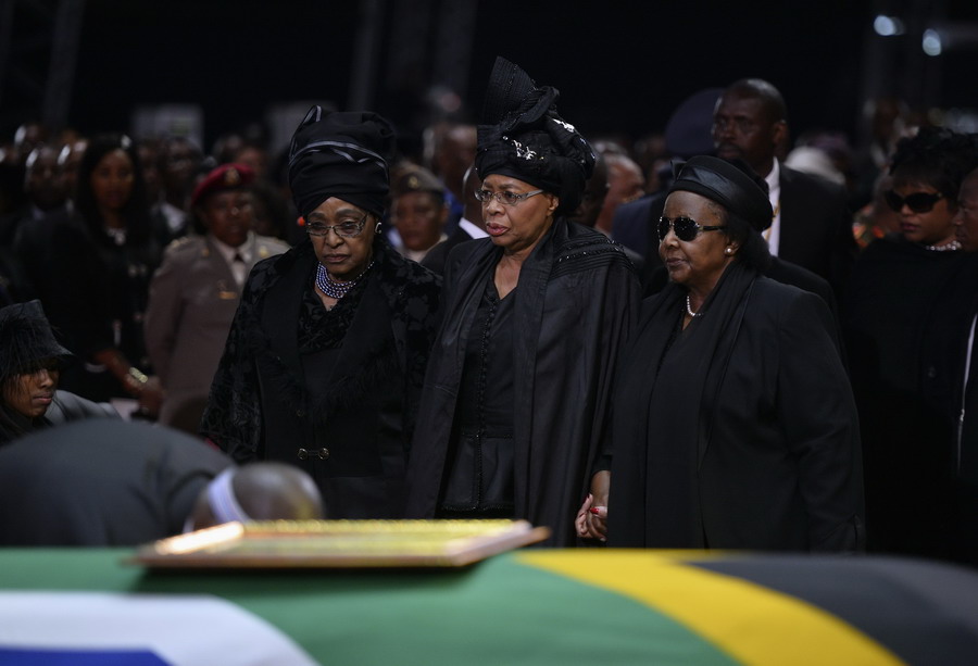 With a hole in its heart, South Africa buries Mandela