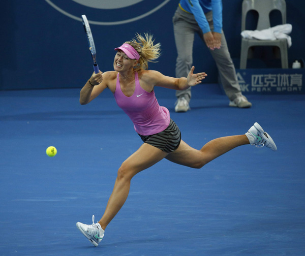 Sharapova survives scare, to meet Serena