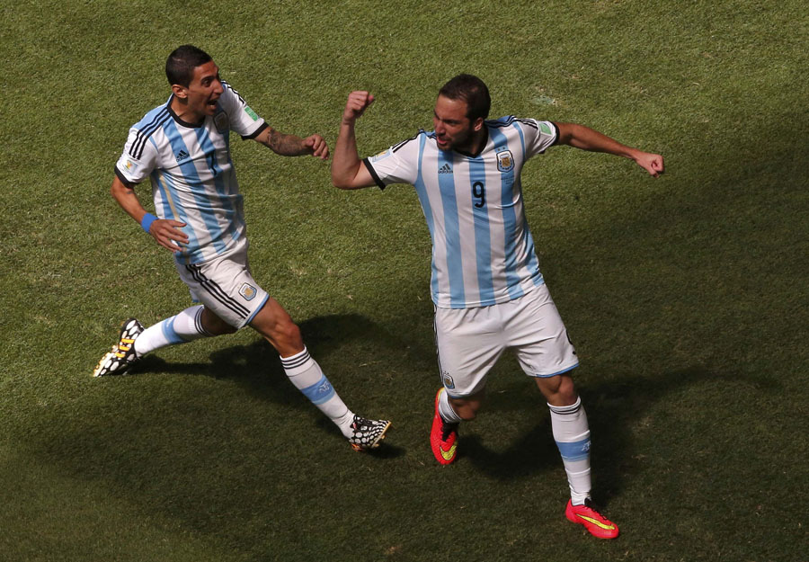 Higuain fires Argentina past Belgium into semis