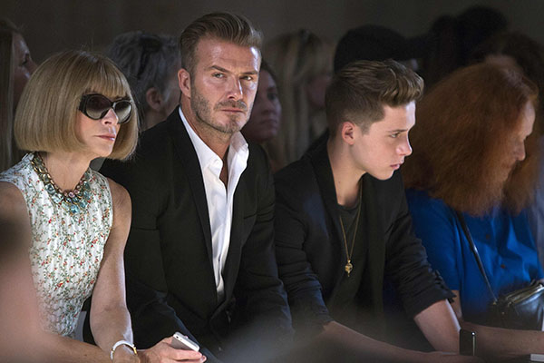 Family man David Beckham dabbles in fashion