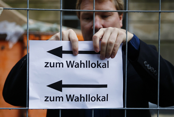 Polls open in Germany's parliamentary vote