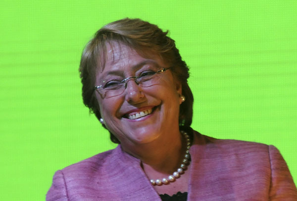 Bachelet triumphs in Chile election but faces runoff