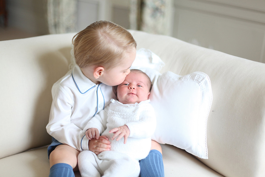 Photos show Princess Charlotte, Prince George together